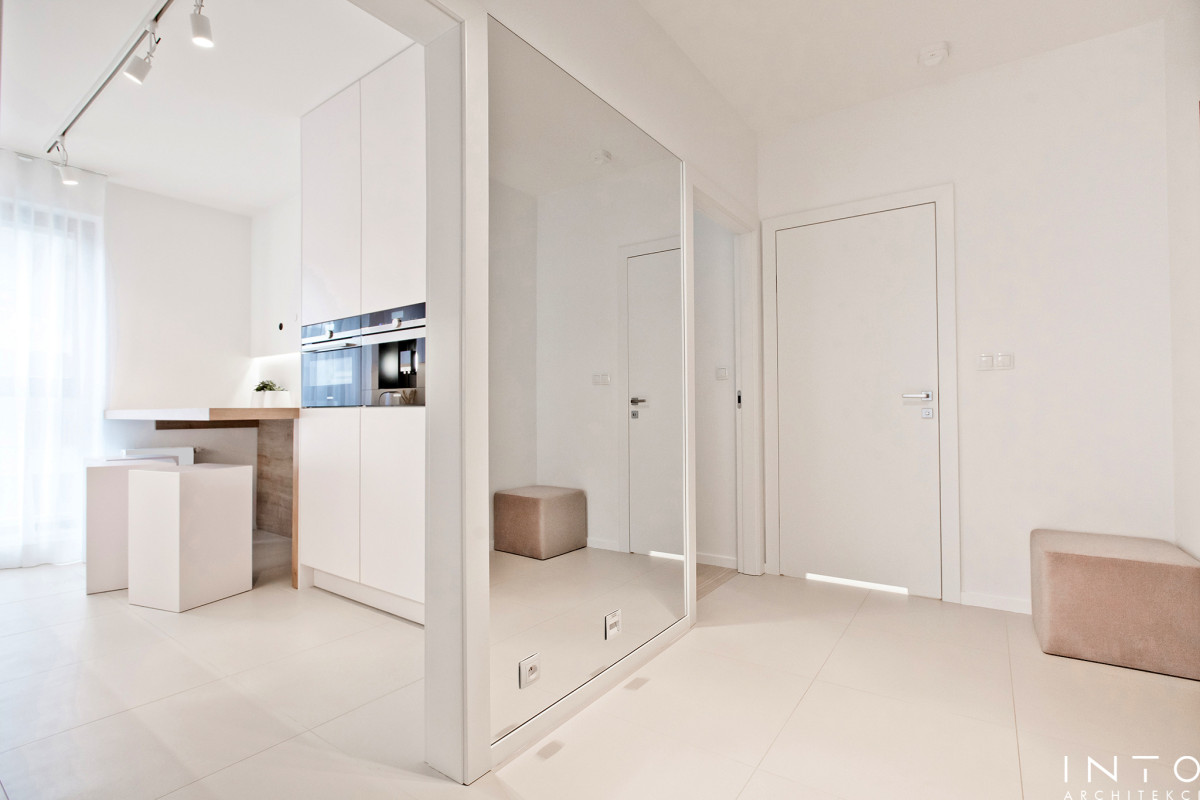 Minimalistyczny projekt wnętrza mieszkania 54 m² w Poznaniu