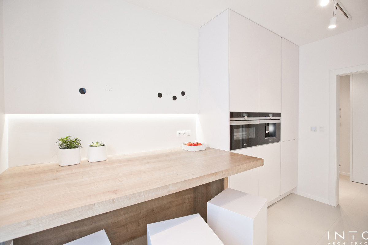 Minimalistyczny projekt wnętrza mieszkania 54 m² w Poznaniu