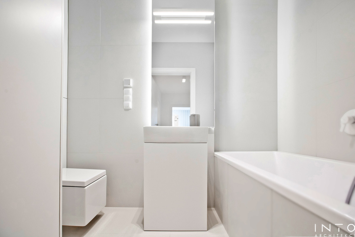 Minimalistyczny projekt wnętrza mieszkania 54 m² w Poznaniu