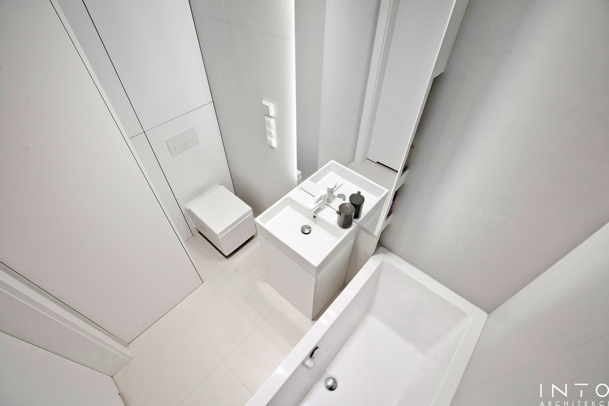 Minimalistyczny projekt wnętrza mieszkania 54 m² w Poznaniu