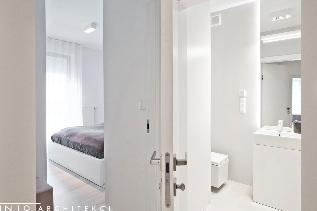 Minimalistyczny projekt wnętrza mieszkania 54 m² w Poznaniu