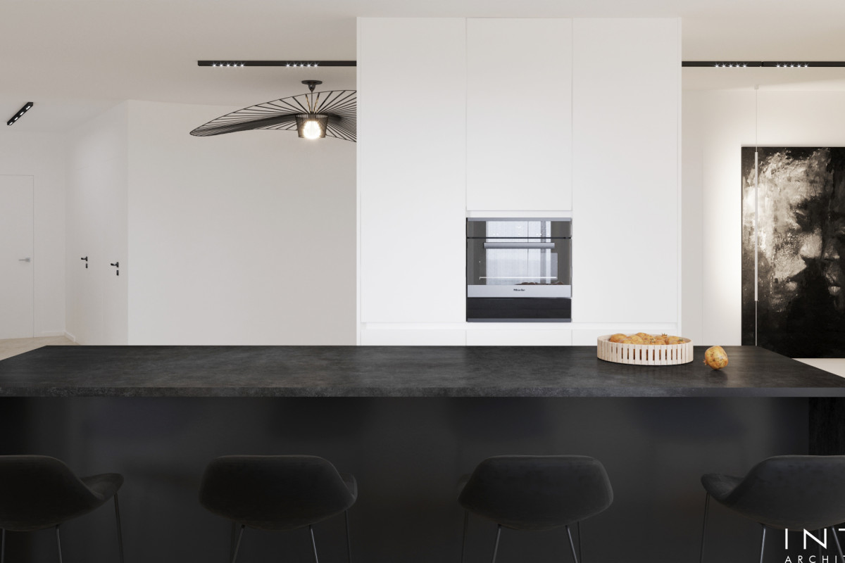 Apartament Warszawa – minimalistyczna przestrzeń z biblioteką